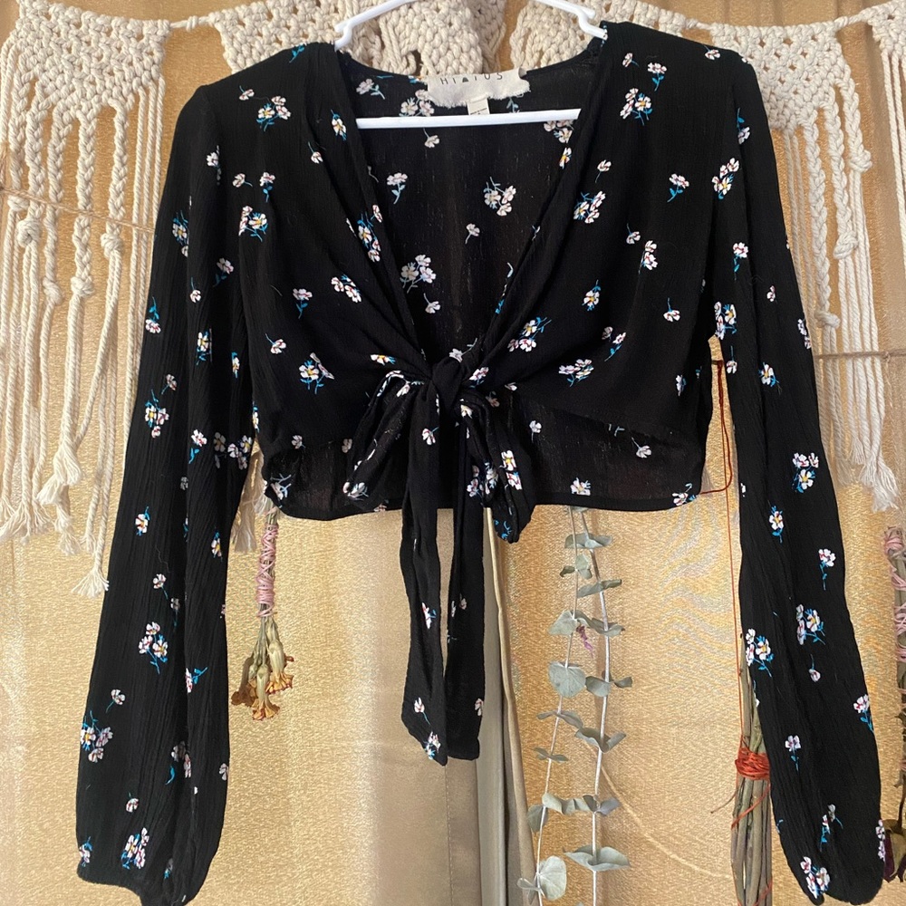 Cropped black long sleeve top, with white and blue flowers